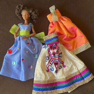African American  Doll with Three Elegant Gowns.